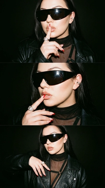 Ultra-realistic Y2K grunge fashion photo triptych, ONE image with 3 horizontal frames stacked vertically. Same woman, same outfit, same black background, photographed seconds apart.

Glossy nude-pink lips, slightly parted. Silver hoop/ear cuff. Oversized black leather jacket with strong shoulders and realistic textured leather. Underneath, semi-sheer black turtleneck top with horizontal strap details across the chest.

Long almond-shaped nails with nude base and sharp red French tips. Massive silver ring with dark stones.

FRAME 1: Medium close-up, body slightly turned, one hand raised to her face, index finger pressed vertically against her lips in a playful "shh" gesture. Head slightly tilted, lips slightly parted, confident expression.

FRAME 2: Closer portrait, finger still near lips, head turned slightly toward camera, glossy lips catching the flash. Leather jacket texture clearly visible.

FRAME 3: Slightly wider frame, body angled differently, hand lowering slightly from the face while maintaining the same bold attitude.

LIGHTING & STYLE: hard direct on-camera flash, strong glossy highlights on lips, skin and leather, deep black background, dramatic shadows, high contrast, subtle film grain, slight analog texture, muted dark colors, authentic late-1990s / early-2000s grunge fashion editorial.

Raw flash photography, disposable-camera / compact-camera feel, slightly imperfect exposure, subtle grain and softness, realistic skin pores and texture.

The result should feel like a rare Y2K fashion photo from an old magazine/editorial archive, edgy, cool, mysterious and effortlessly confident, not modern polished fashion photography.

Realistic anatomy, natural hands and fingers, accurate jewelry, realistic leather and fabric textures.

Очки: Огромные черные солнцезащитные очки-щитки с массивной оправой, полностью закрывающей глаза. Глубокие черные линзы и глянцевая черная оправа создают яркий футуристический образ в стиле 2000-х. Очки отражают яркий свет от прямой вспышки камеры и идеально вписываются в редакционный стиль гранжа конца 1990-х — начала 2000-х.