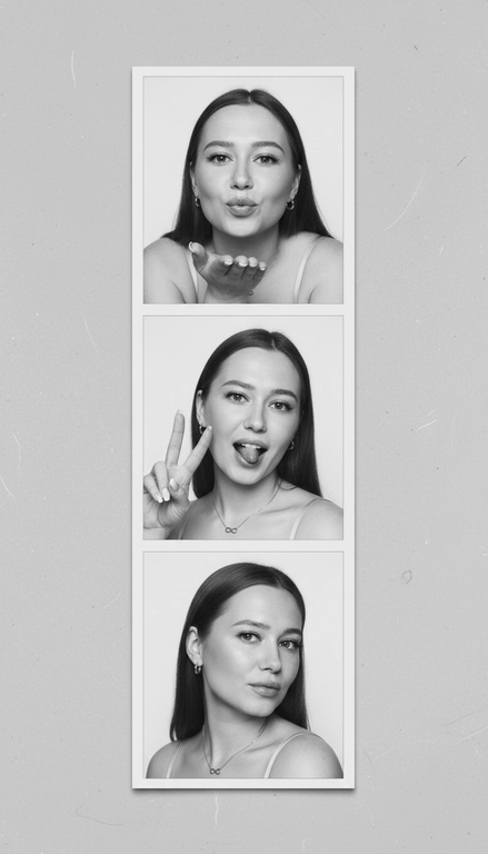  Используя мою фотографию в качестве референса для лица и волос, не изменяя исходные черты лица и сохраняя верность моим физическим характеристикам, создайте ленту из фотографий в ч/б с тремя вертикальными белыми рамками. Лента выглядит так, будто лежит на столе или фоне. Фотографии выглядят профессионально , как будто из настоящей фотобудки. 

В каждой рамке по центру расположены портрет и фотография погрудной проекции одного и того же человека. Взгляд прямо в камеру.

Общая эстетика винтажная, с лёгкой зернистостью и выцветшим качеством, напоминающая классическую аналоговую фотографию. Но при этом изображение выполнено в высоком разрешении. На светло-сером фоне видны едва заметные следы пыли и царапин. Лица человека на белом фоне. 
НЕ ИЗМЕНЯЙТЕ МОЁ ЛИЦО. На верхнем фото девушка посылает зрителю воздушный поцелуй, поднеся правую руку ко рту и слегка поджав губы. Выражение её лица игривое и дружелюбное.  На среднем фото девушка мило и игриво показывает знак мира, высунув язык. Брови слегка приподняты. На нижнем фото девушка позирует, отвернувшись к плечу, смотрит прямо в камеру с более спокойным и уверенным выражением лица. Губы мягко сжаты, взгляд прямой и чувственный. ОДЕЖДА: На ней маленькие серьги-кольца и изящное ожерелье с символом бесконечности поверх светлого атласного или шёлкового топа. На ней естественный макияж, включая глянцевый блеск для губ, лёгкую подводку для глаз и кукольные нарощенные ресницы, без излишеств. У неё квадратный французский маникюр. 