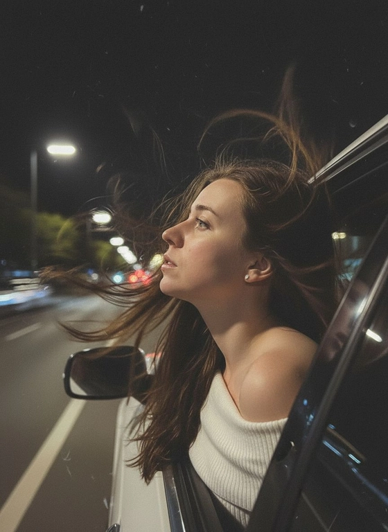 Создайте фото, где я высунула голову из окна машины в тёмную, мечтательную, размытую, винтажную ветреную ночь, в белом трикотажном топе с открытыми плечами. ракурс боковой. Голова чутка откинута назад. Машина в движении.  Выражение лица мечтательное, губы немного приоткрыты. Волосы развеваются в движении. Сохраните детали лица в точности. Пожалуйста, не изменяйте черты лица и оставь таким, какое оно есть.