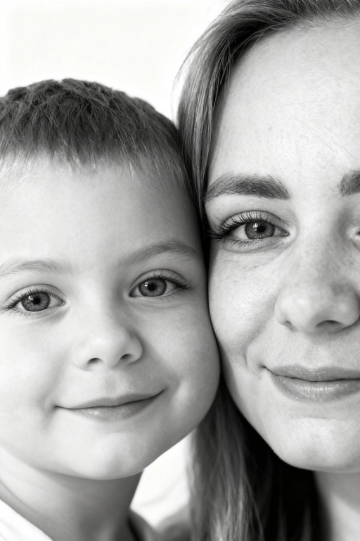 Сверхреалистичная черно-белая художественная фотография 8K женщины и ребенка, снятая очень крупным планом, щека к щеке так что видны только правая половина лица женщины и левая половина лица ребенка. которые смотрят в камеру. Их лица расположены рядом, почти соприкасаясь, образуя идеально сбалансированную симметричную композицию. Каждая деталь передана с фотографической точностью: тонкая текстура кожи и плавные градиенты света и тени. Видимая половина женщины включает ее бровь, один глаз , часть ее носа, щеку и губы, слегка приоткрытые в нежной, естественной улыбке, Видимая половина ребенка включает один глаз , круглую мягкую щеку, часть носа и небольшую улыбку, Фон белый и слегка размытый, что подчеркивает эмоциональную близость между ними. Освещение мягкое и рассеянное, создает деликатный контраст и тональную глубину. На снимке запечатлены нежность, близость и связь между матерью и ребенком, запечатленные с потрясающей реалистичностью. Не меняй черты лиц. 